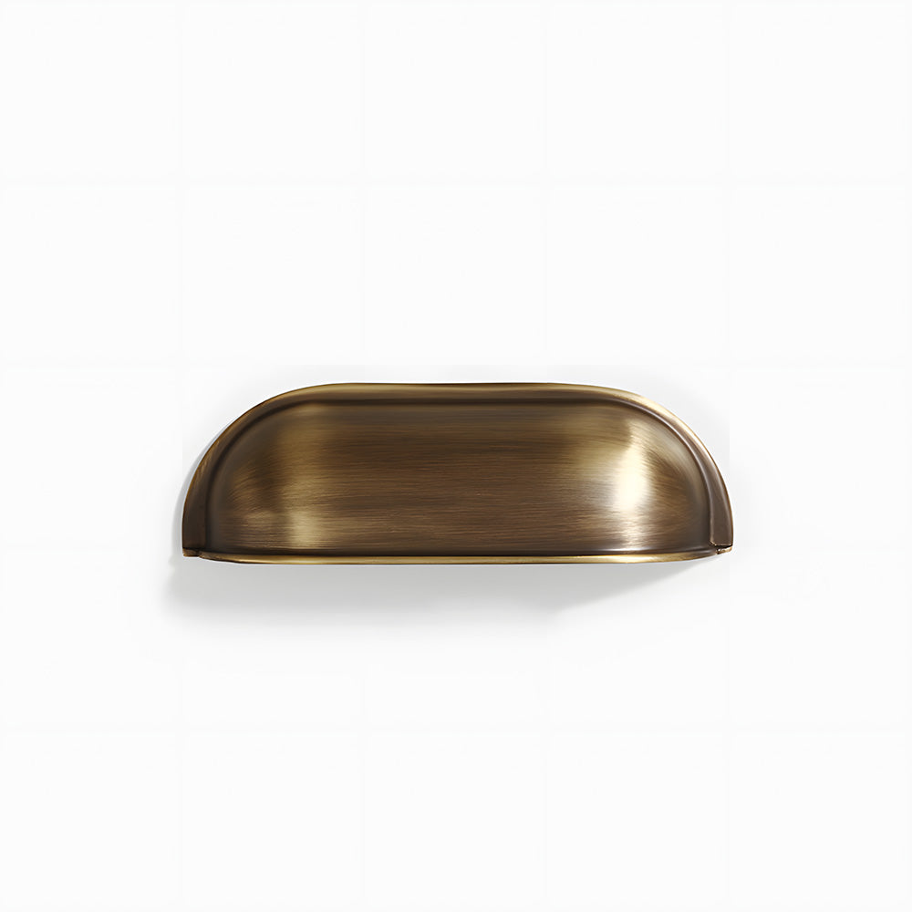 Antique bronze retro shell cup pull and round knob, displayed from the side on a clean neutral background