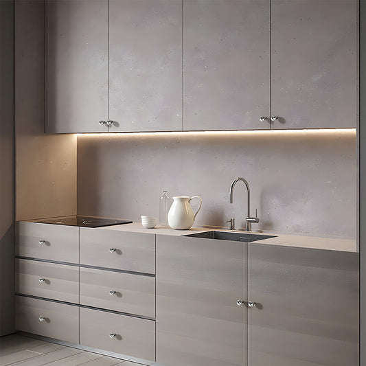 Silver retro shell cup pull and round knob, displayed from the side installed on cabinetry in context