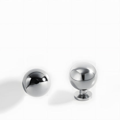 Silver retro shell cup pull and round knob, shown from one angle with its shape and finish visible