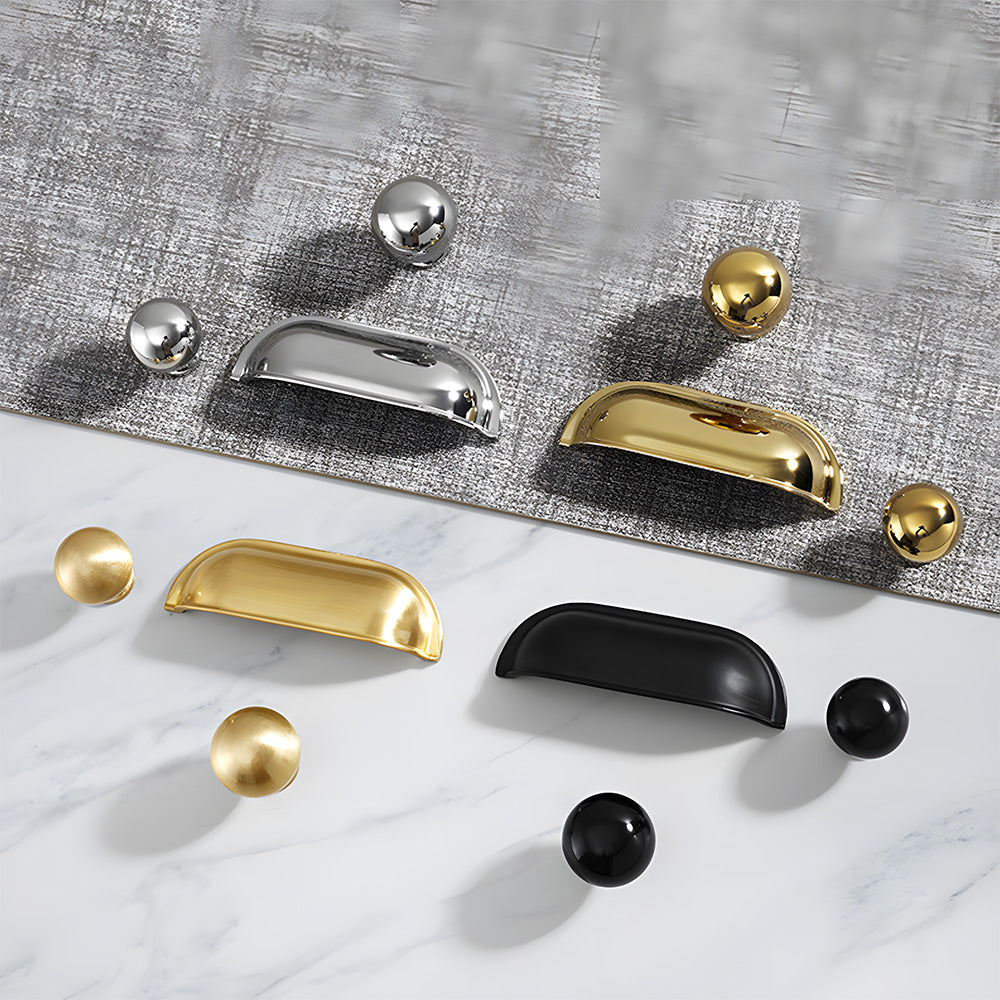 Retro shell cup pull and round knob, shown from one angle as a color and finish lineup