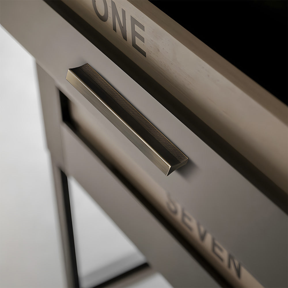 Antique bronze ribbed retro recessed cabinet pull, shown clearly in an installed cabinet close-up
