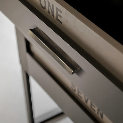 Antique bronze ribbed retro recessed cabinet pull, shown clearly in an installed cabinet close-up