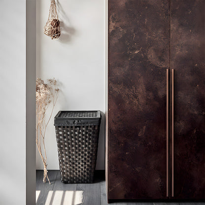 Red bronze ribbed retro recessed cabinet pull, shown from one angle installed on cabinetry in context