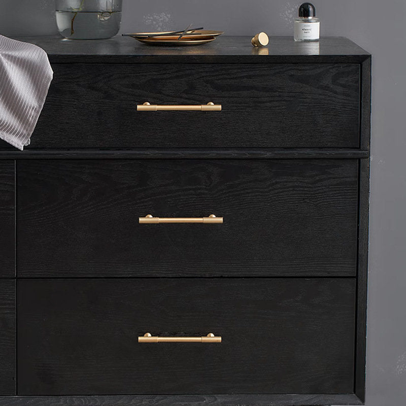 Gold ribbed bar cabinet pull and round knob, pictured in one view mounted on a finished cabinet front