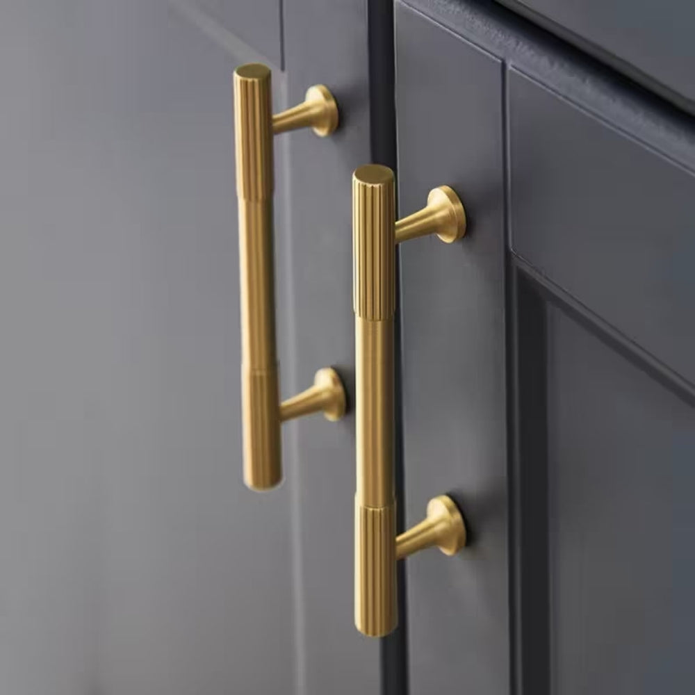 Ribbed bar cabinet pull and round knob, shown clearly in an installed cabinet close-up