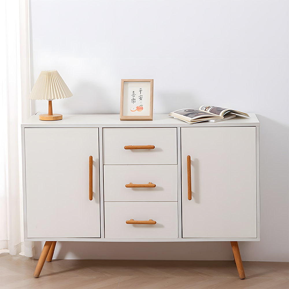 Rounded wood cabinet pull in natural wood with 128 mm centers, shown across a complete storage cabinet in a room setting