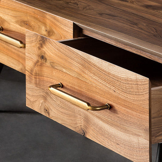 Smooth bronze cabinet pull with gently bent ends, shown clearly installed on cabinetry in context