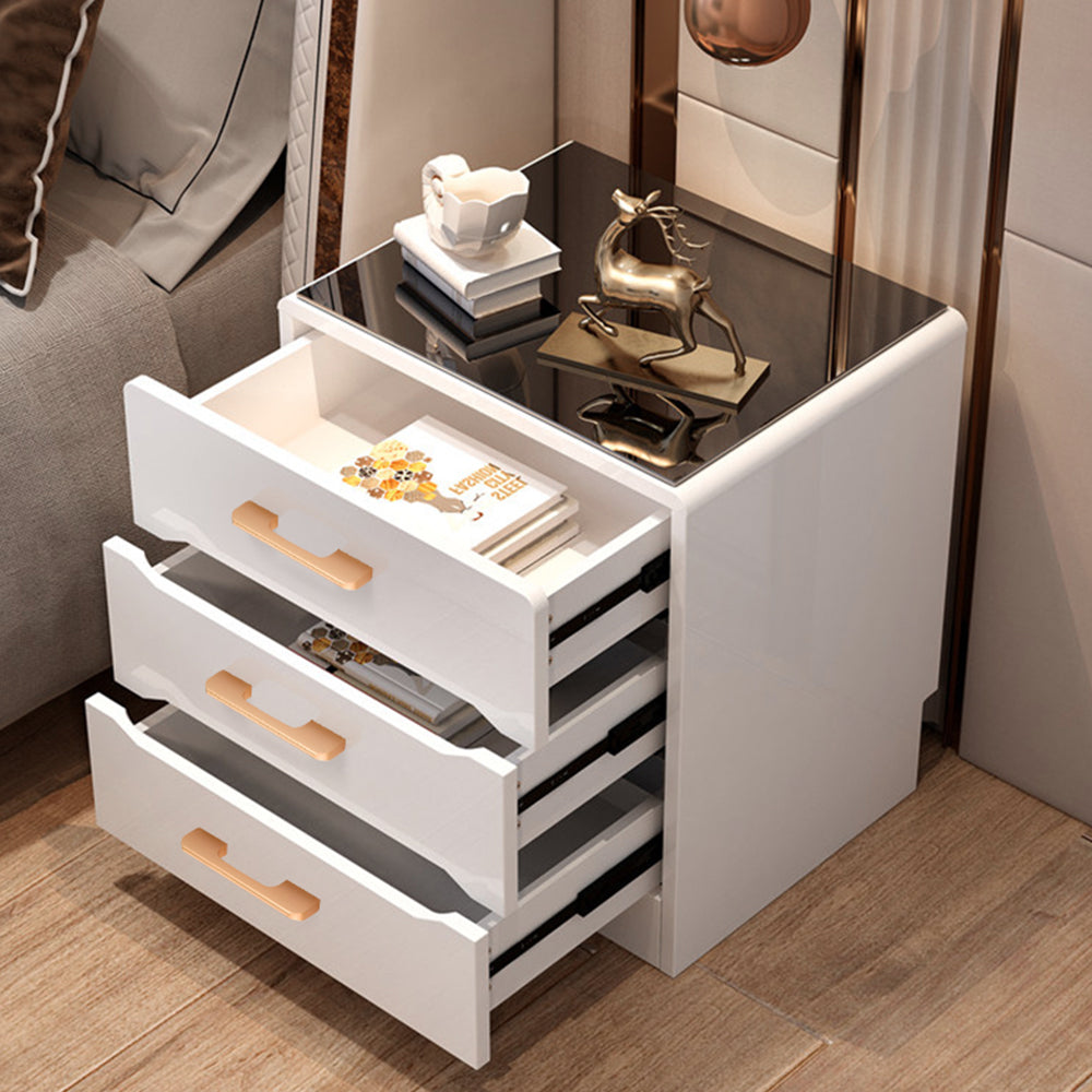Champagne bronze cabinet pulls with 96 mm hole centers installed on white bedside drawers