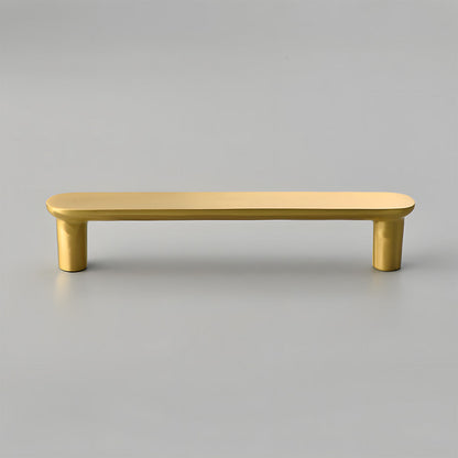 Gold brass rounded bar cabinet pull, displayed from the side on a clean neutral background