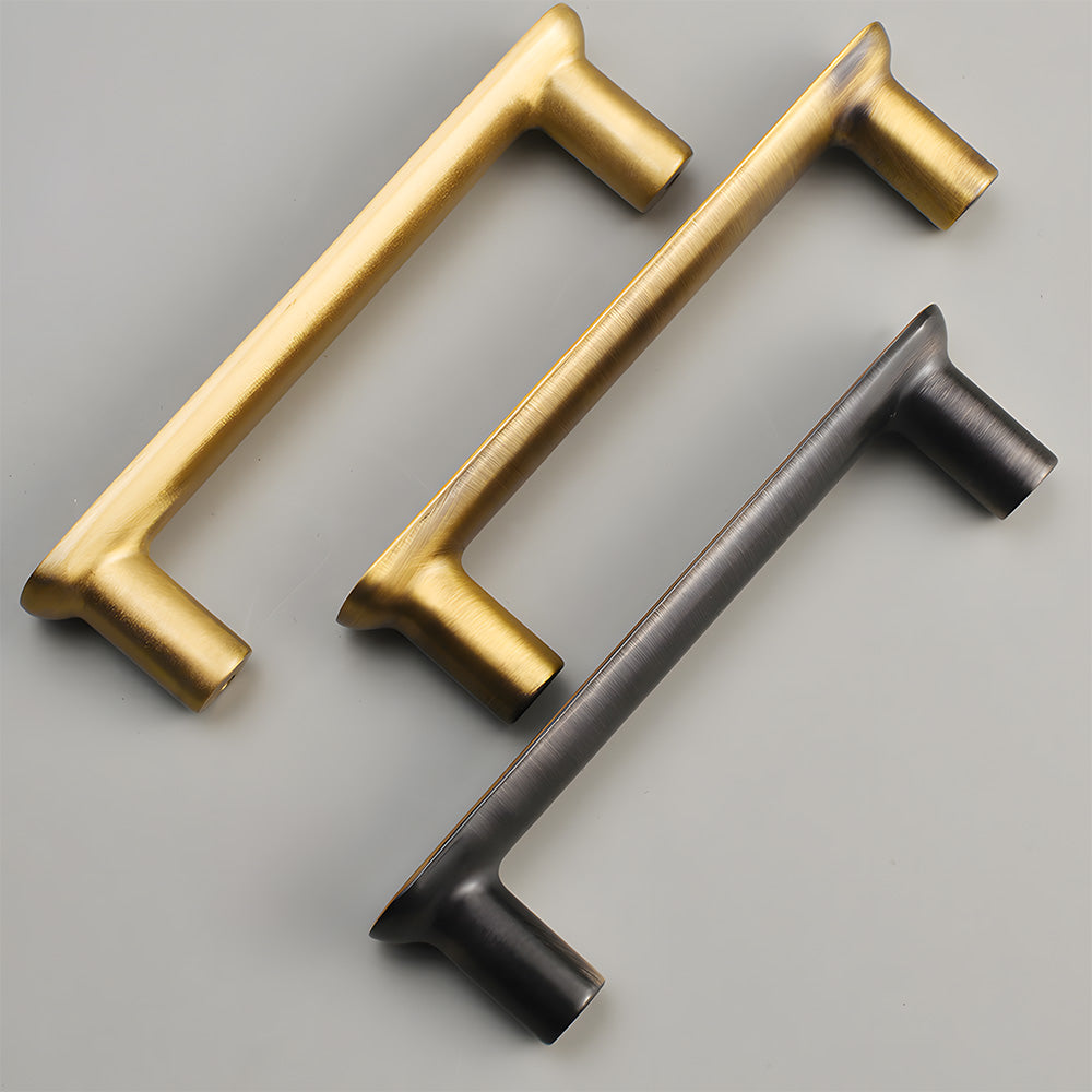 Brass rounded bar cabinet pull, shown at close range as a color and finish lineup