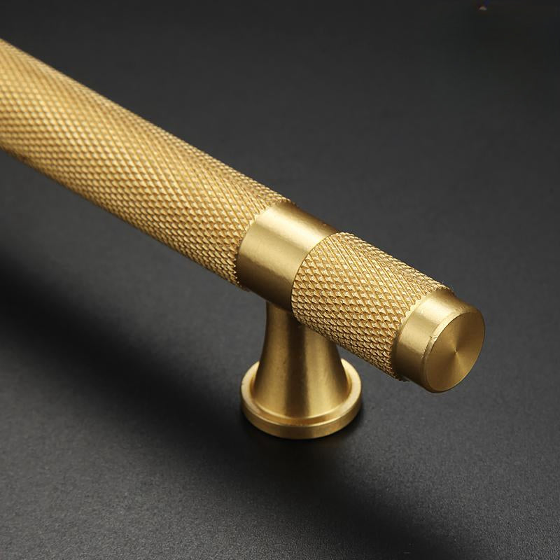 Knurled brass T-bar cabinet pull, pictured in one view with its construction and finish visible