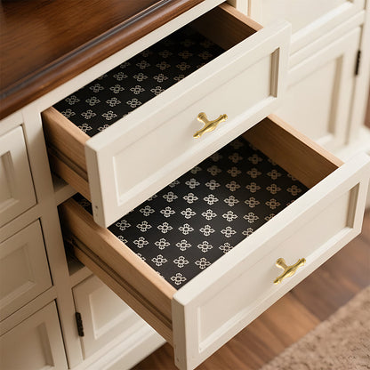 Gold brass twisted cabinet pull and knobs, presented for reference installed on cabinetry in context