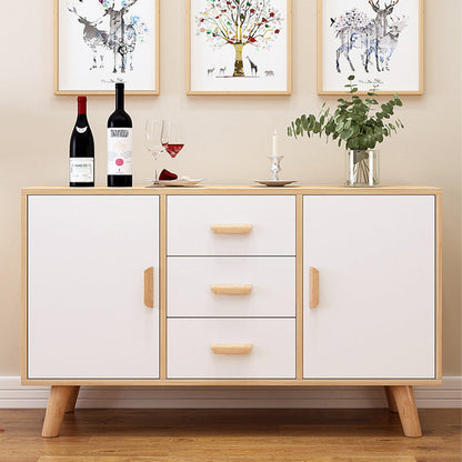 Wood half-round cabinet finger pull in beech with 96 mm centers, installed on a storage cabinet in a wider room view