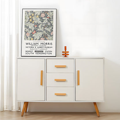L-shaped wood cabinet pull in natural wood with 96 mm centers, shown across a complete storage cabinet in a room setting