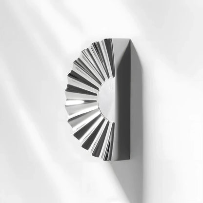 Sunburst half-moon cabinet pull and round knob, pictured in one view with its shape and finish visible