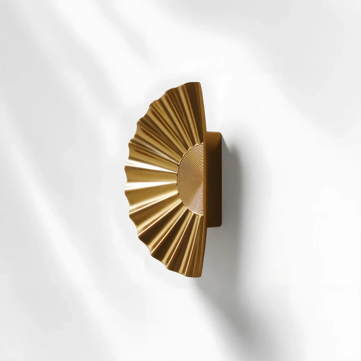 Sunburst half-moon cabinet pull and round knob, shown from one angle with the profile and mounts in view