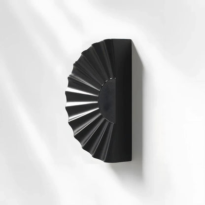 Black sunburst half-moon cabinet pull and round knob, displayed from the side with the profile and mounts in view