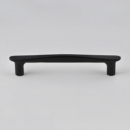 Tapered arched brass cabinet pull, displayed from the side on a clean neutral background