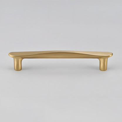 Tapered arched brass cabinet pull, pictured in one view on a clean neutral background