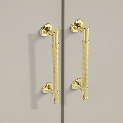 Textured round bar cabinet pull and knob, pictured in one view in an installed cabinet close-up