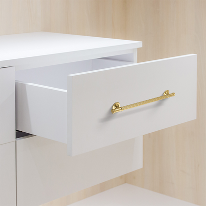 Textured round bar cabinet pull and knob, shown in a focused view installed on cabinetry in context