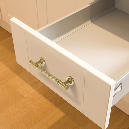 Textured round bar cabinet pull and knob, shown from one angle mounted on a finished cabinet front