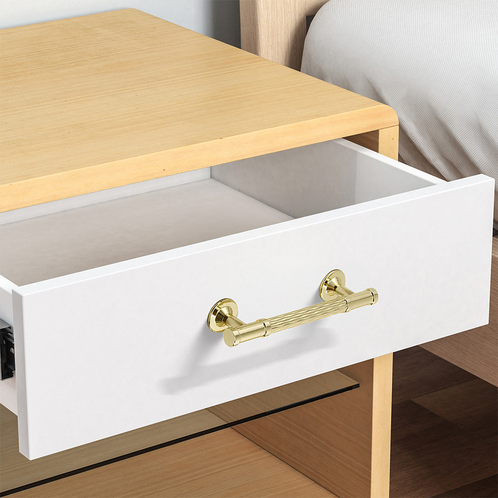 Textured round bar cabinet pull and knob, displayed from the side mounted on a finished cabinet front