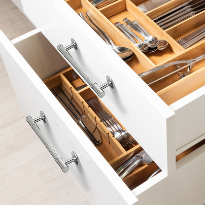 Textured round bar cabinet pull and knob, shown in a focused view mounted on a finished cabinet front
