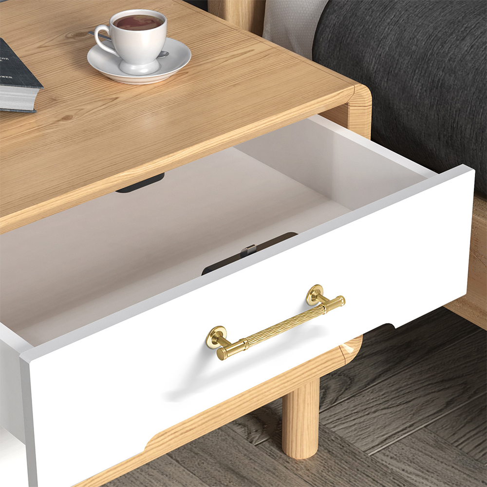 Textured round bar cabinet pull and knob, shown clearly installed on cabinetry in context