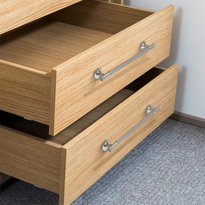 Textured round bar cabinet pull and knob, presented in another view mounted on a finished cabinet front