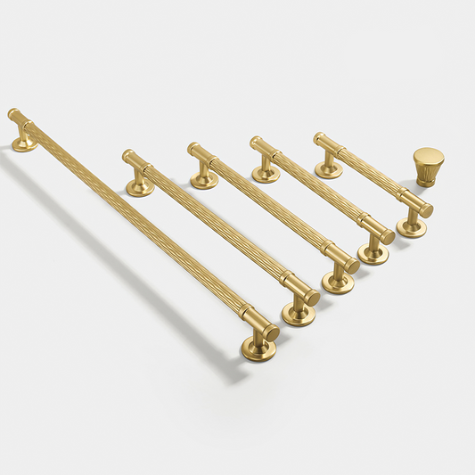 Gold textured round bar cabinet pull and knob, shown from one angle as a color and finish lineup