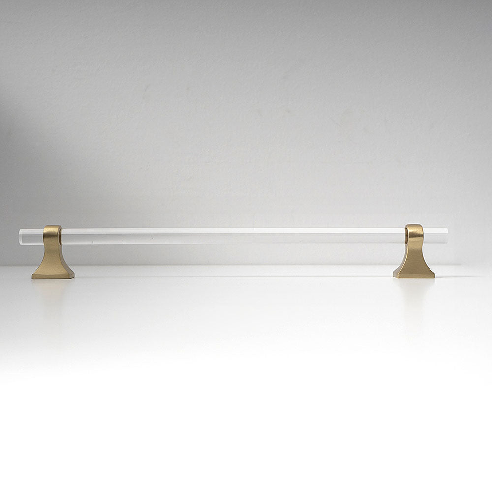 Transparent acrylic bar pull with flared metal mounts, shown at close range on a clean neutral background