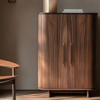Two-tone wood and metal cabinet pull, shown from one angle installed on cabinetry in context