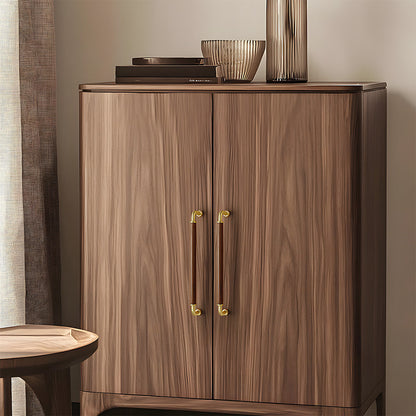 Two-tone wood and metal cabinet pull, pictured in one view installed on cabinetry in context