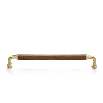 Brushed gold two-tone wood and metal cabinet pull, shown at close range with its shape and finish visible