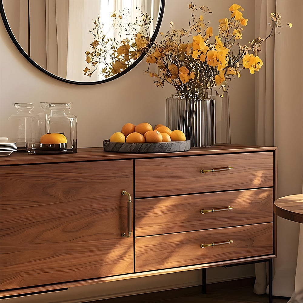 Antique bronze two-tone wood and metal cabinet pull, shown at close range installed on cabinetry in context