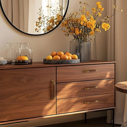 Antique bronze two-tone wood and metal cabinet pull, shown at close range installed on cabinetry in context