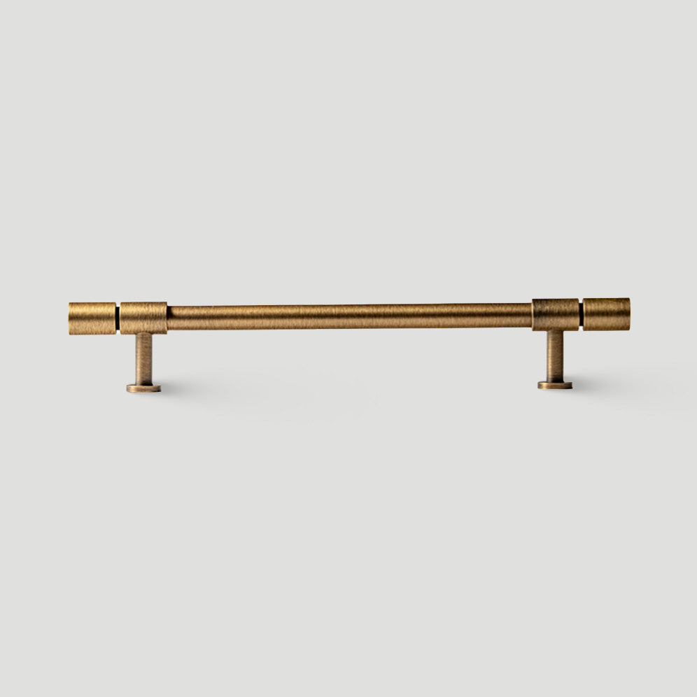 Vintage bronze brass T-bar cabinet pull, pictured in one view on a clean neutral background