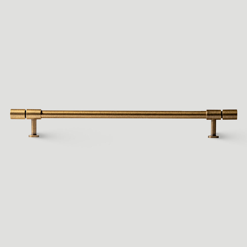 Vintage bronze brass T-bar cabinet pull, presented for reference on a clean neutral background