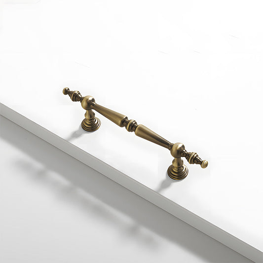 Bronze vintage decorative bar cabinet pull, displayed from the side with its shape and finish visible