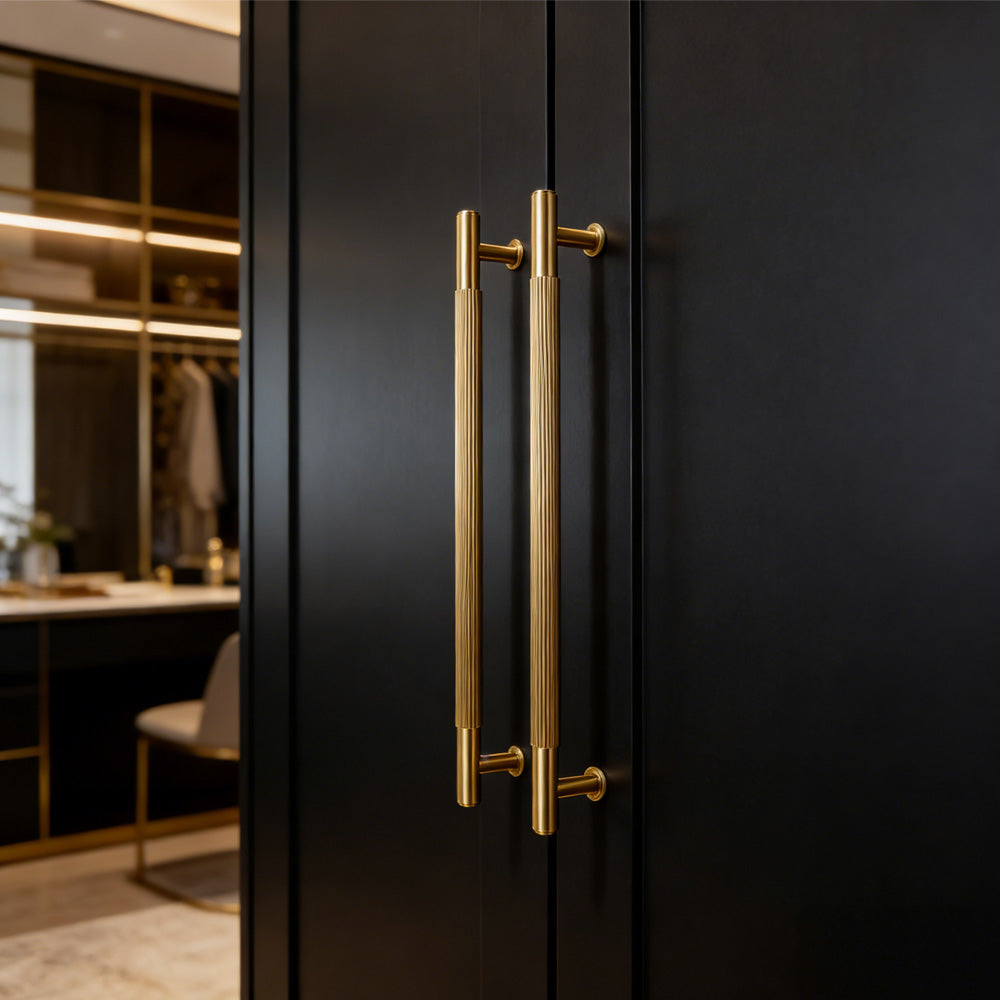 Lined aged-bronze brass T-bar cabinet pull and knob, shown clearly installed on cabinetry in context