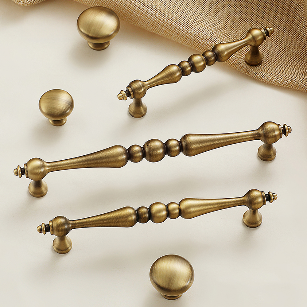 Bronze vintage turned brass cabinet pull and round knob, presented in another view as a color and finish lineup