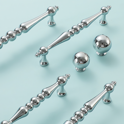 Vintage turned brass cabinet pull and round knob, pictured in one view with available finishes visible