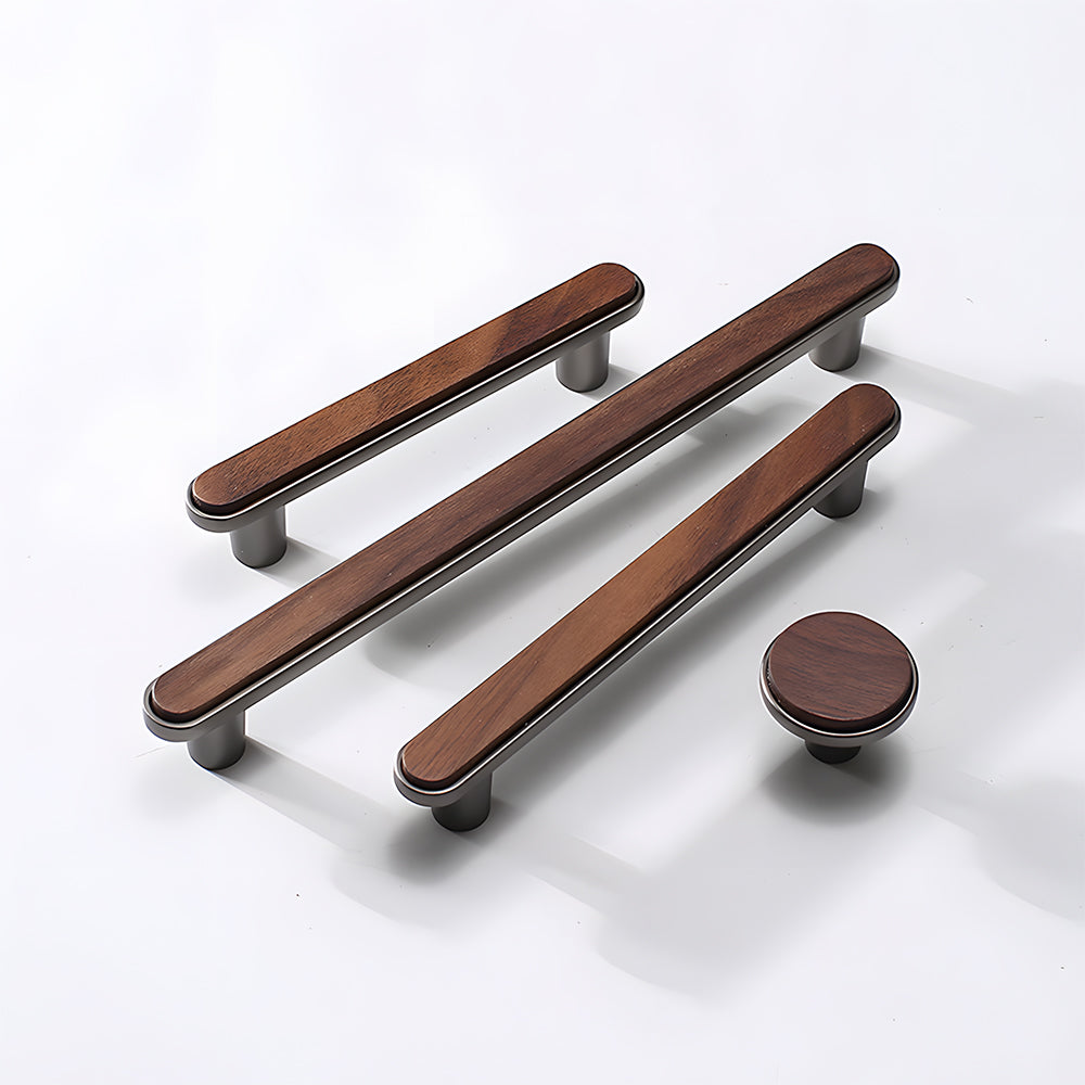 Walnut wood inlay cabinet pull with a silver-toned frame, grouped in long and short versions on a neutral surface