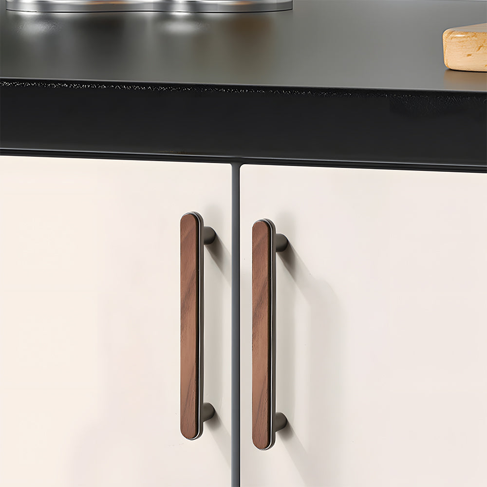 Walnut inlay cabinet pull in gray with 96 mm centers, installed on light cabinet doors with the profile visible