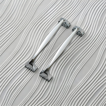 Wide arched brass cabinet pull with flared square ends, presented in another view as a color and finish lineup