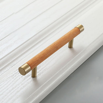 Wood cabinet handle with brass end caps, shown alone in a clean front view on a pale background