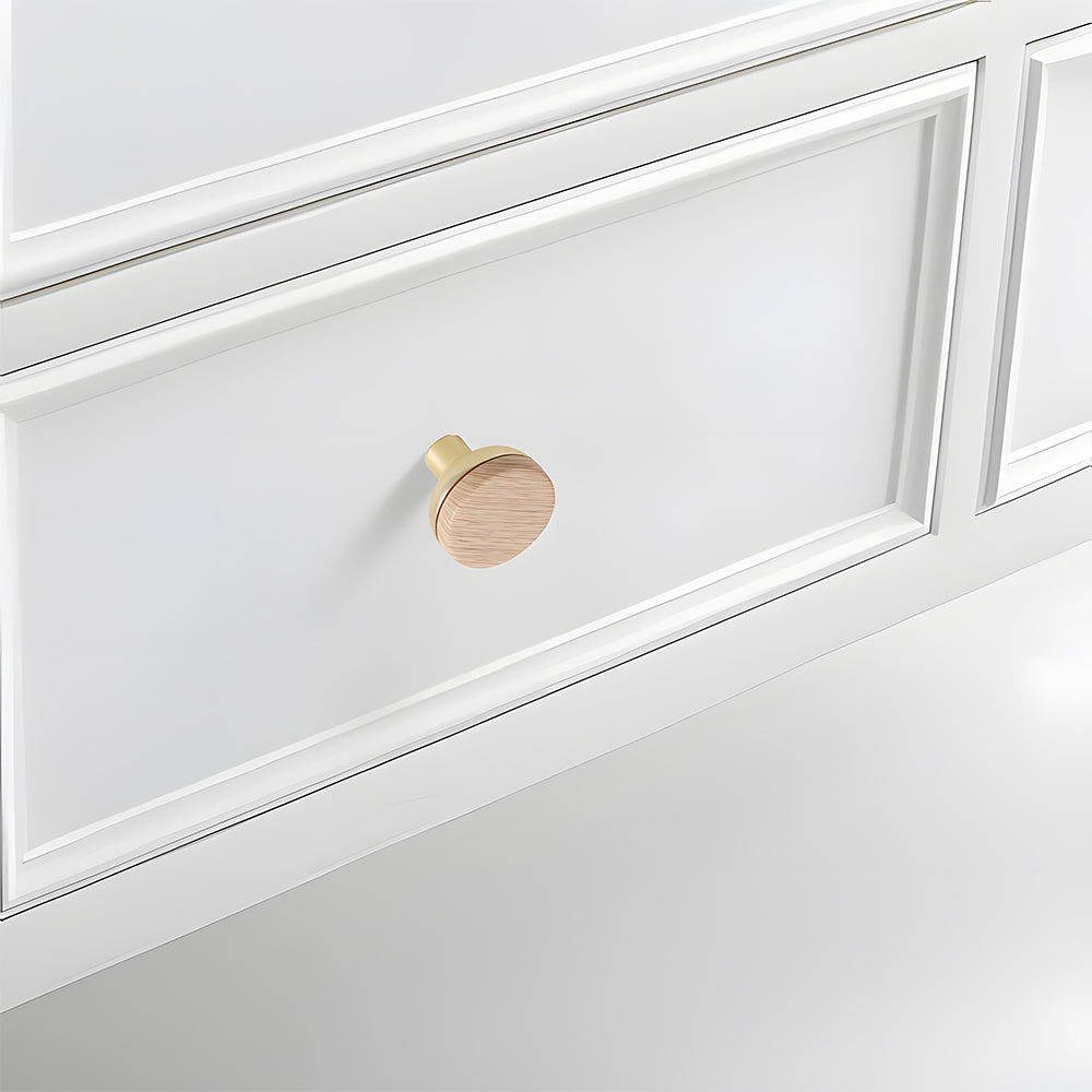 Wood-grain cabinet pull, installed on light cabinet doors with the profile visible