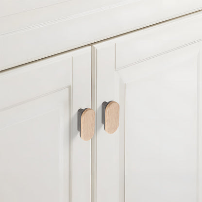 Wood-grain cabinet pull, shown in a close installed view across cabinet fronts, with the finish clearly visible