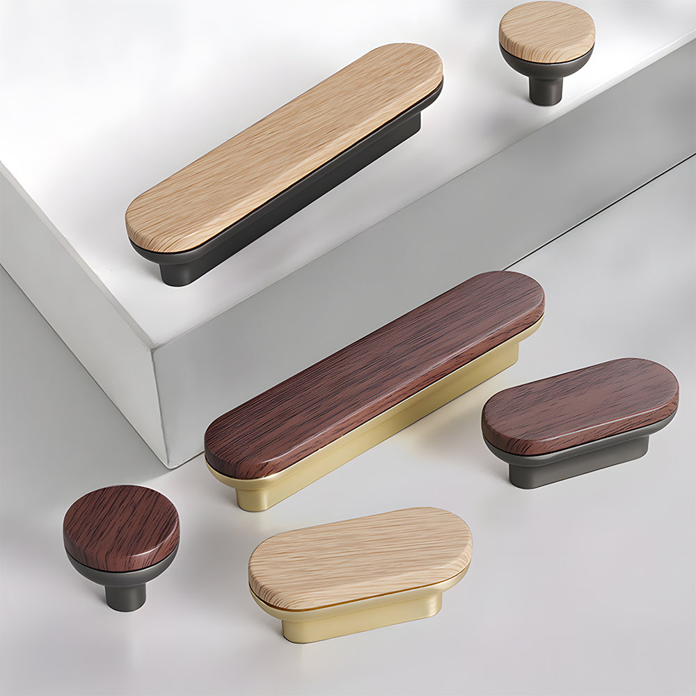 Wood-grain cabinet pull with a rounded metal base, shown in a styled group with multiple available versions